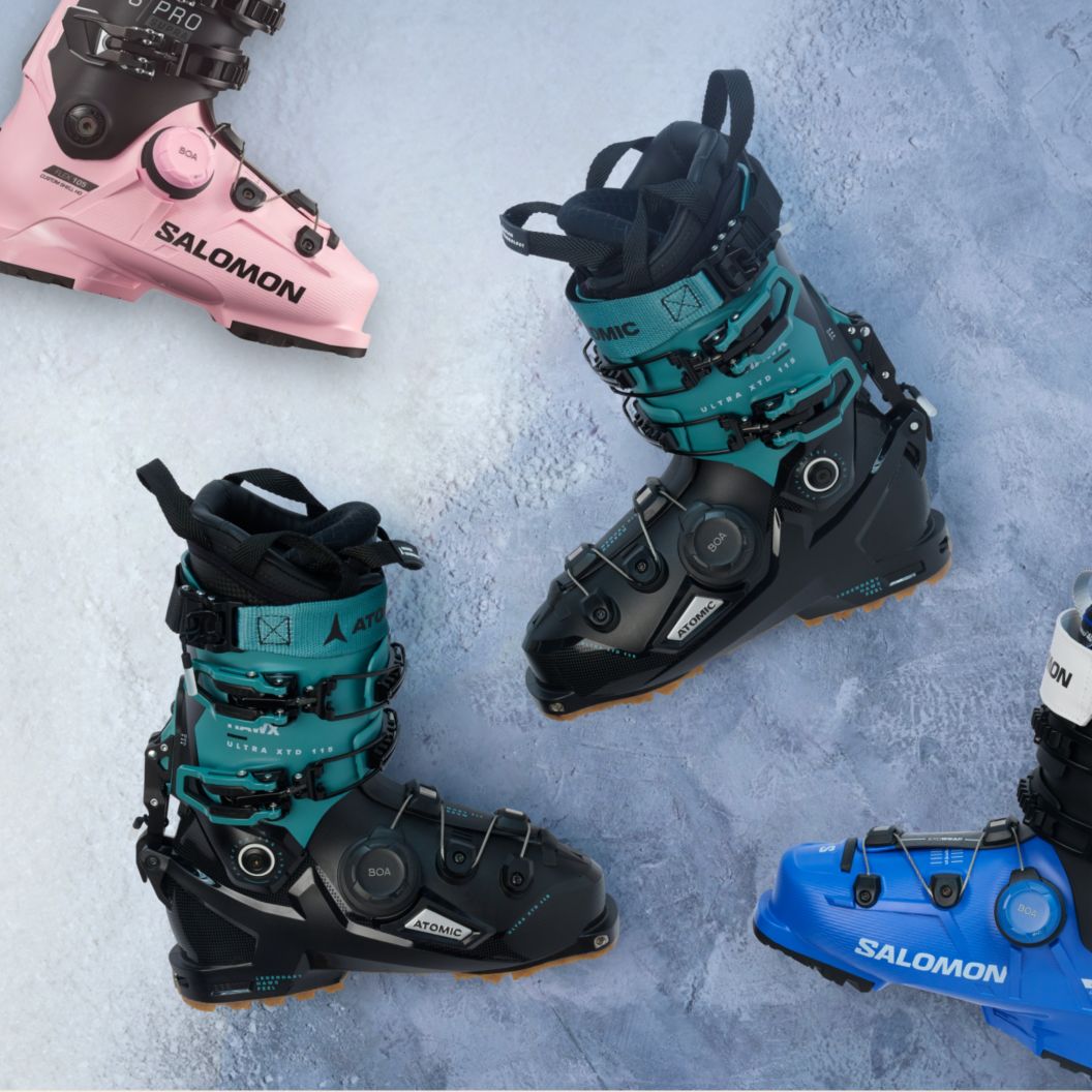   A few pairs of BOA-powered ski boots against an icy background.  